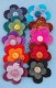 FIORI SCIOLTI IN LANA COTTA, A DUE CORONE ARROTOND