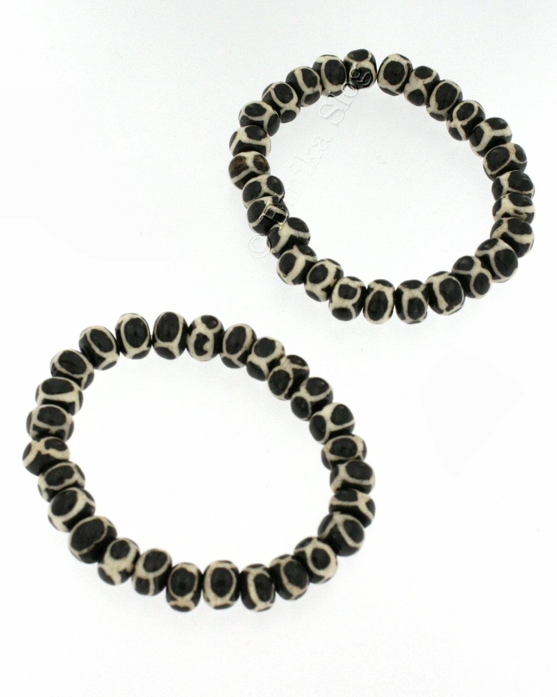 BRACCIALETTO ELASTICO CON COMPONENTI IN OSSO CON D BRACCIALETTO ELASTICO CON COMPONENTI IN OSSO CON D
