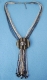 COLLANA LUNGA CON PERLINE E PENDENTE IN CORNObr /
