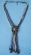 COLLANA LUNGA CON PERLINE E PENDENTE IN CORNObr /