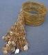 BRACCIALETTO PERLINE CON CODA PAILLETTES E PERLINE